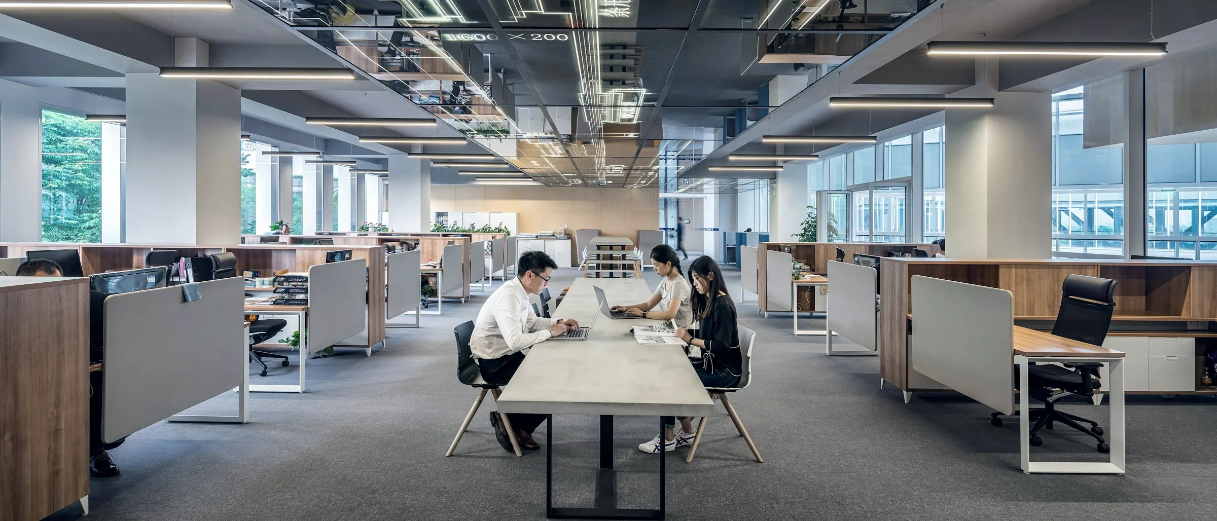 Open-plan office with people at work